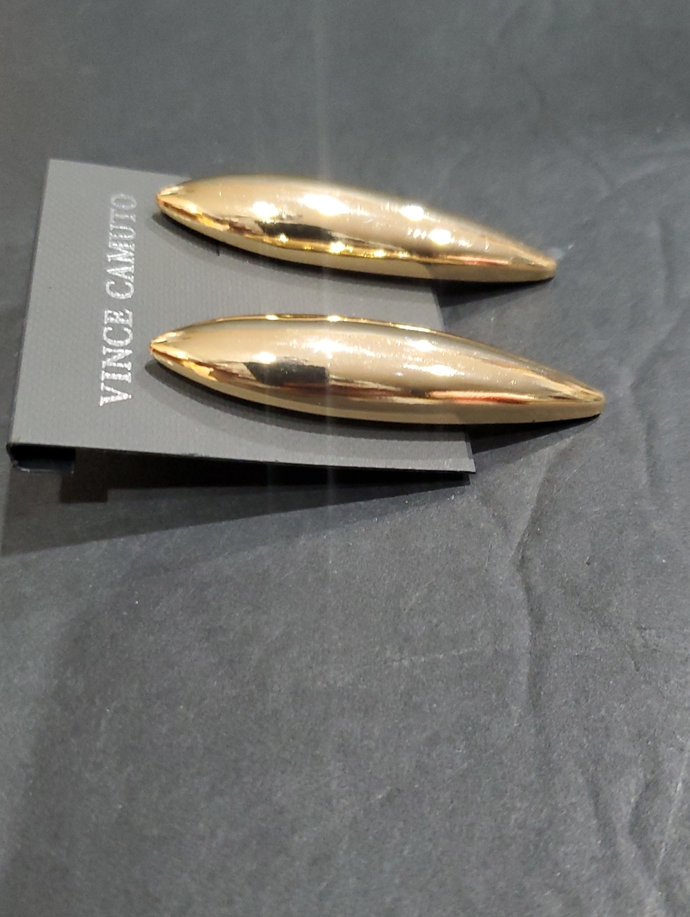 Vince Camuto gold plated oversized ellipse dagger style earrings brand new